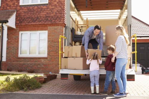 Household furniture being transported by local movers in Roehampton