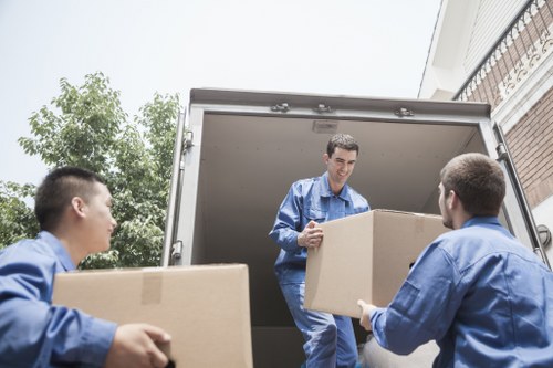 Local Roehampton moving truck loaded with household furniture and boxes
