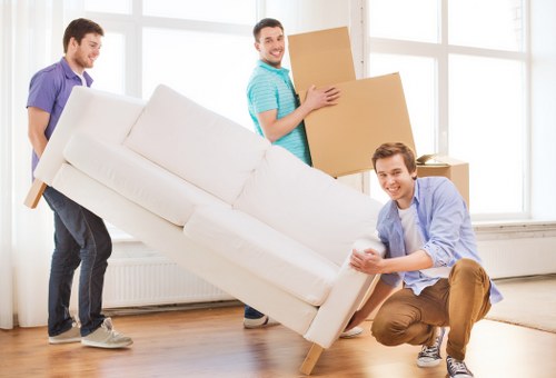 Packed moving boxes and furniture ready for house removals in Roehampton