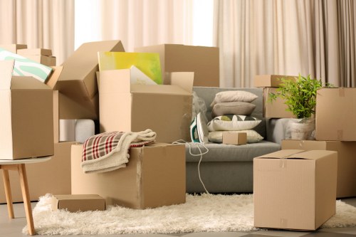 Loading boxes and furniture into a moving van in Roehampton