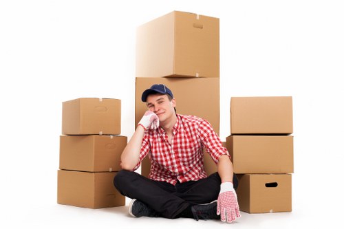 Local team handling office furniture during a Roehampton move