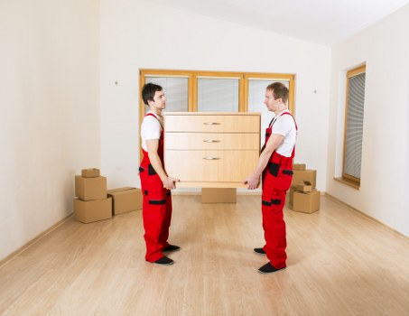 Careful loading of household furniture for a local Roehampton move