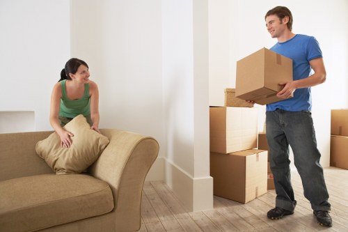Removal van transporting household boxes and furniture
